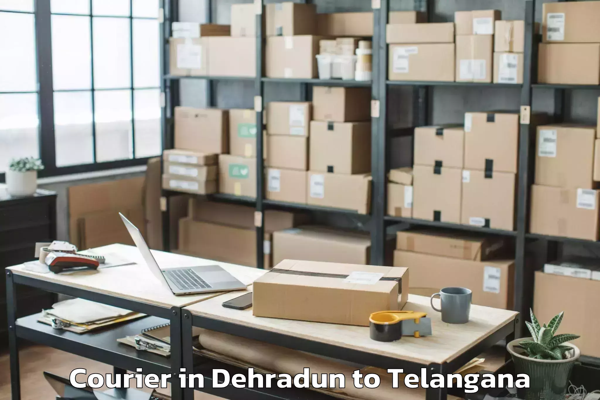 Trusted Dehradun to Anumula Courier